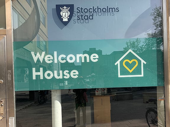 Skylt på Welcome House